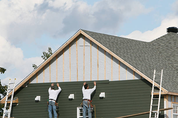 Professional Siding Replacement technician working in Belle Center, OH